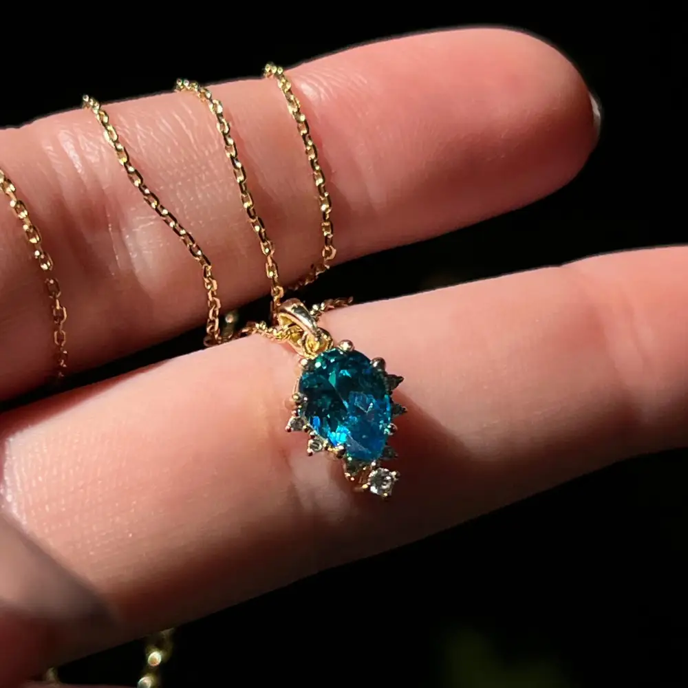 Celestial Drop - Blue Topaz Upside-Down Teardrop Necklace - Image 4