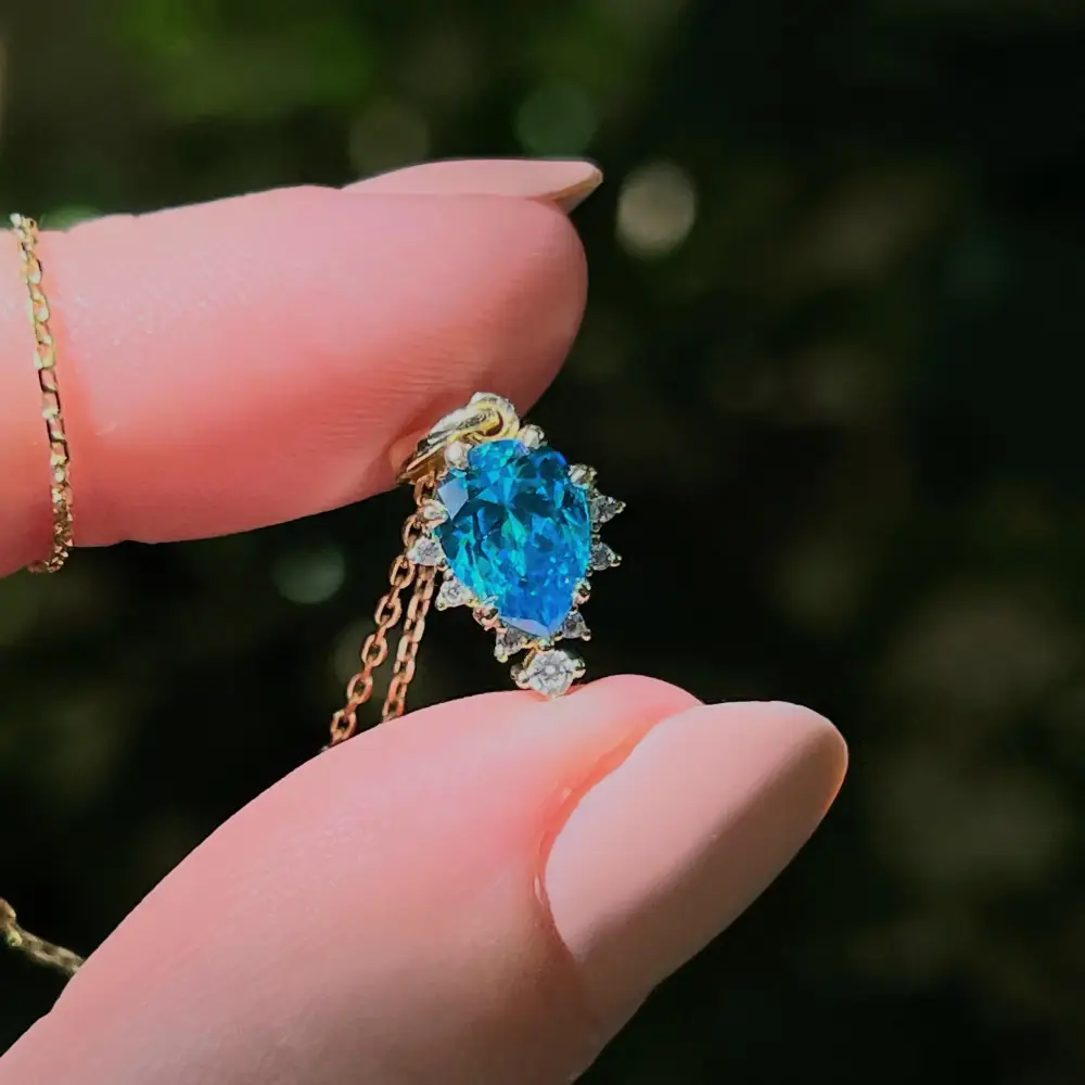 Celestial Drop - Blue Topaz Upside-Down Teardrop Necklace - Image 5