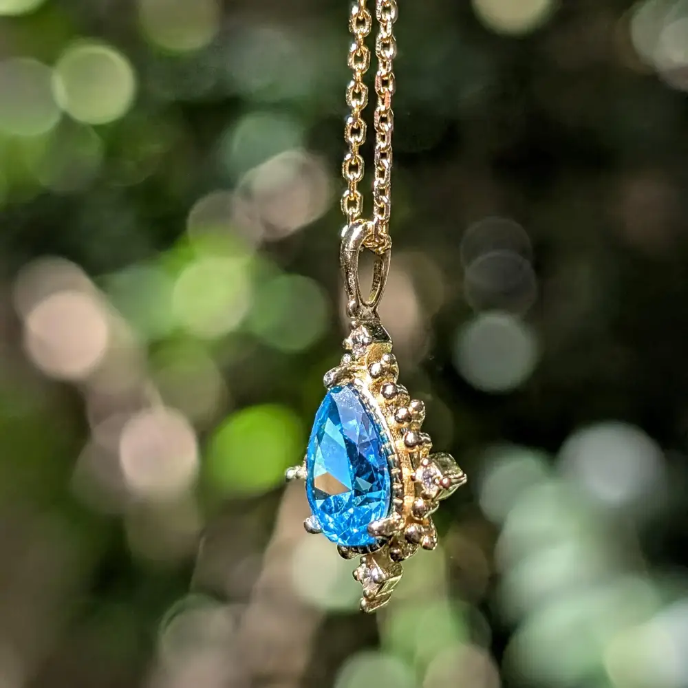 Vintage Teardrop Blue Topaz Halo Pendant Necklace - Image 8
